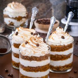 Eggless Tiramisu Trifle Cups on a brown plate