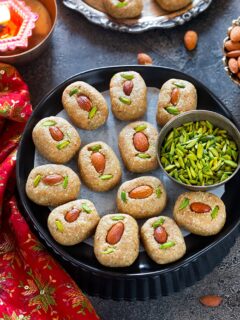 Gur Mava Pinni on a black plate