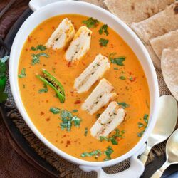 Paneer pieces dunked in pasanda gravy