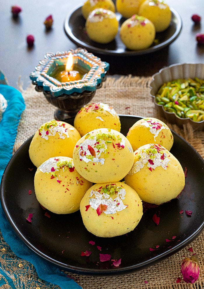 Ladoo on a black plate