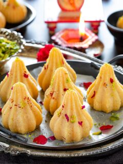 Sooji modak garnished with pistachios